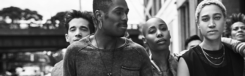 Group of people standing outside in a city