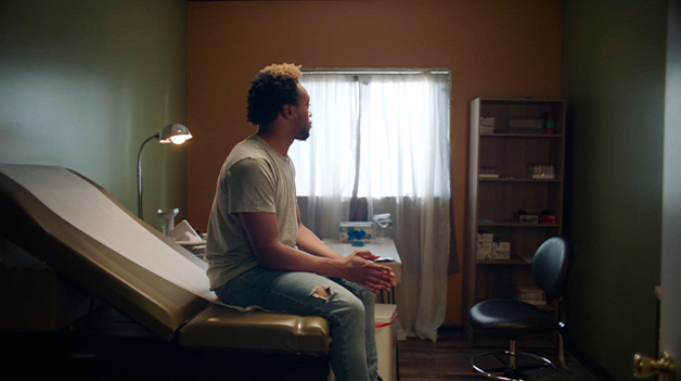 A man sitting in a doctor’s office